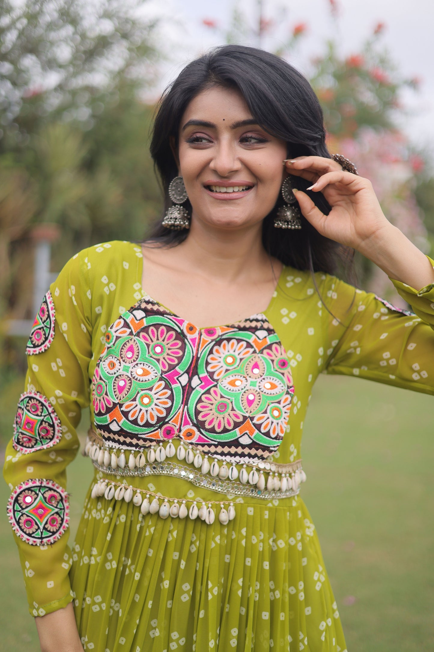 Awesome Parrot Green Faux Georgette Bandhani Printed Designer Gown for Navratri