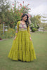 Awesome Parrot Green Faux Georgette Bandhani Printed Designer Gown for Navratri
