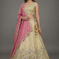 Elegant Beige Tissue Silk Embroidered Designer Lehenga Choli with Pink Dupatta for Wedding