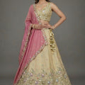 Elegant Beige Tissue Silk Embroidered Designer Lehenga Choli with Pink Dupatta for Wedding