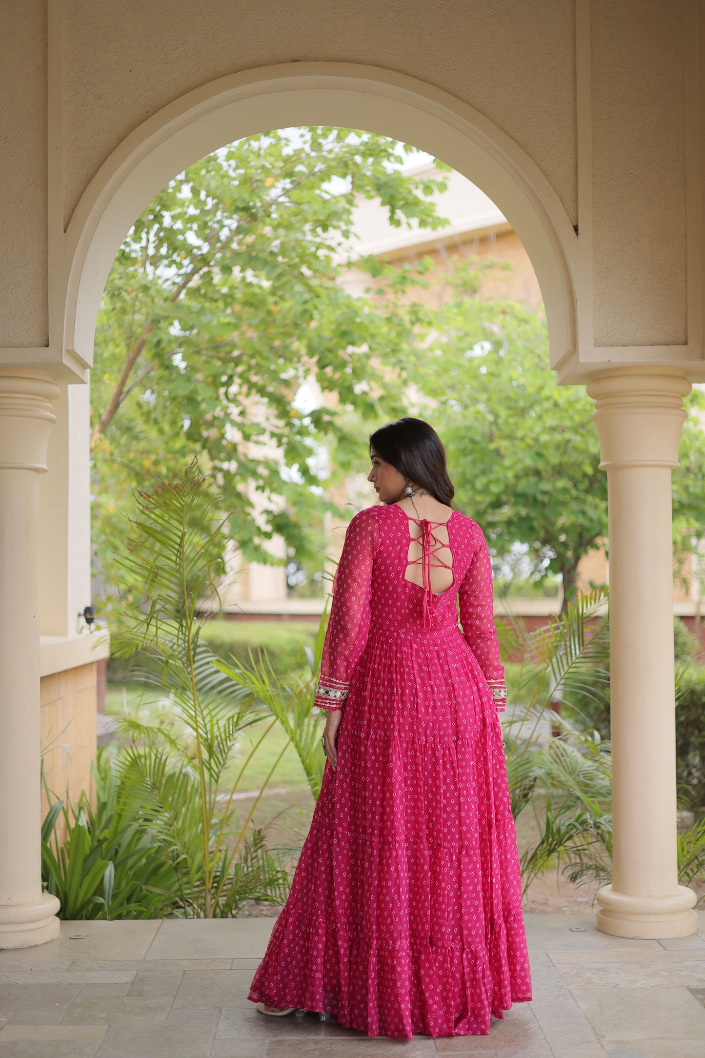 Beautiful Rani Pink Faux Georgette Bandhani Printed Designer Gown with Kutchi Patch Work