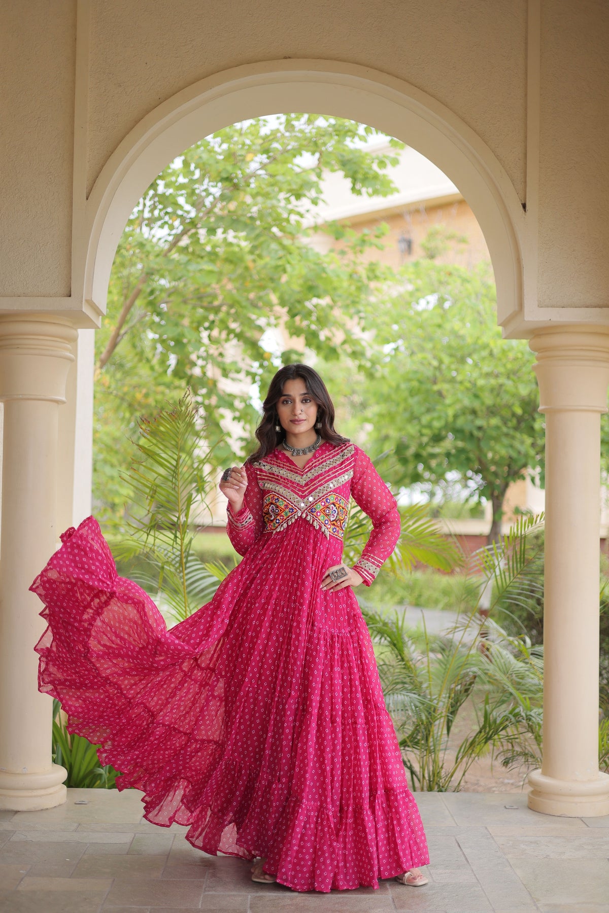 Beautiful Rani Pink Faux Georgette Bandhani Printed Designer Gown with Kutchi Patch Work