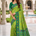 Graceful Lime Green Patola Silk Woven Meenakari Jacquard Designer Saree for Women