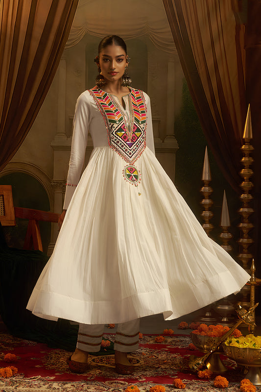 Elegant White Cotton Embroidered Anarkali Suit with Vibrant Kutchi Yoke and Tassels for Women