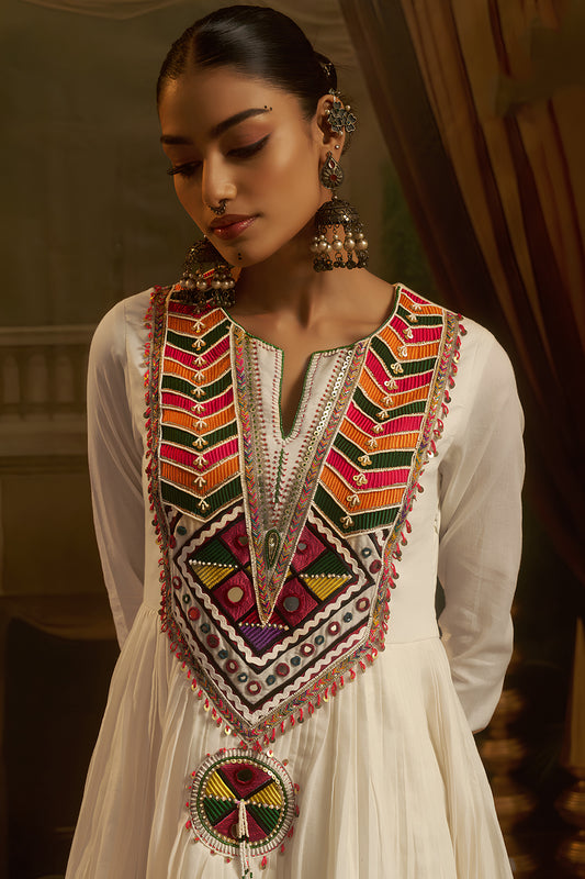 Elegant White Cotton Embroidered Anarkali Suit with Vibrant Kutchi Yoke and Tassels for Women