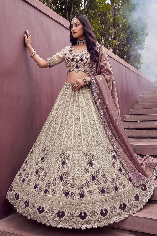 Stunning Off-White and Purple Silk Heavy Embroidered Designer Lehenga Choli with Dupatta