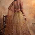 Charming Rust Orange Net Heavy Embroidered Designer Lehenga Choli with Dupatta