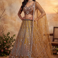 Charming Rust Orange Net Heavy Embroidered Designer Lehenga Choli with Dupatta