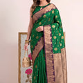 Lovely Green Silk Woven Designer Saree with Zari Border for Women