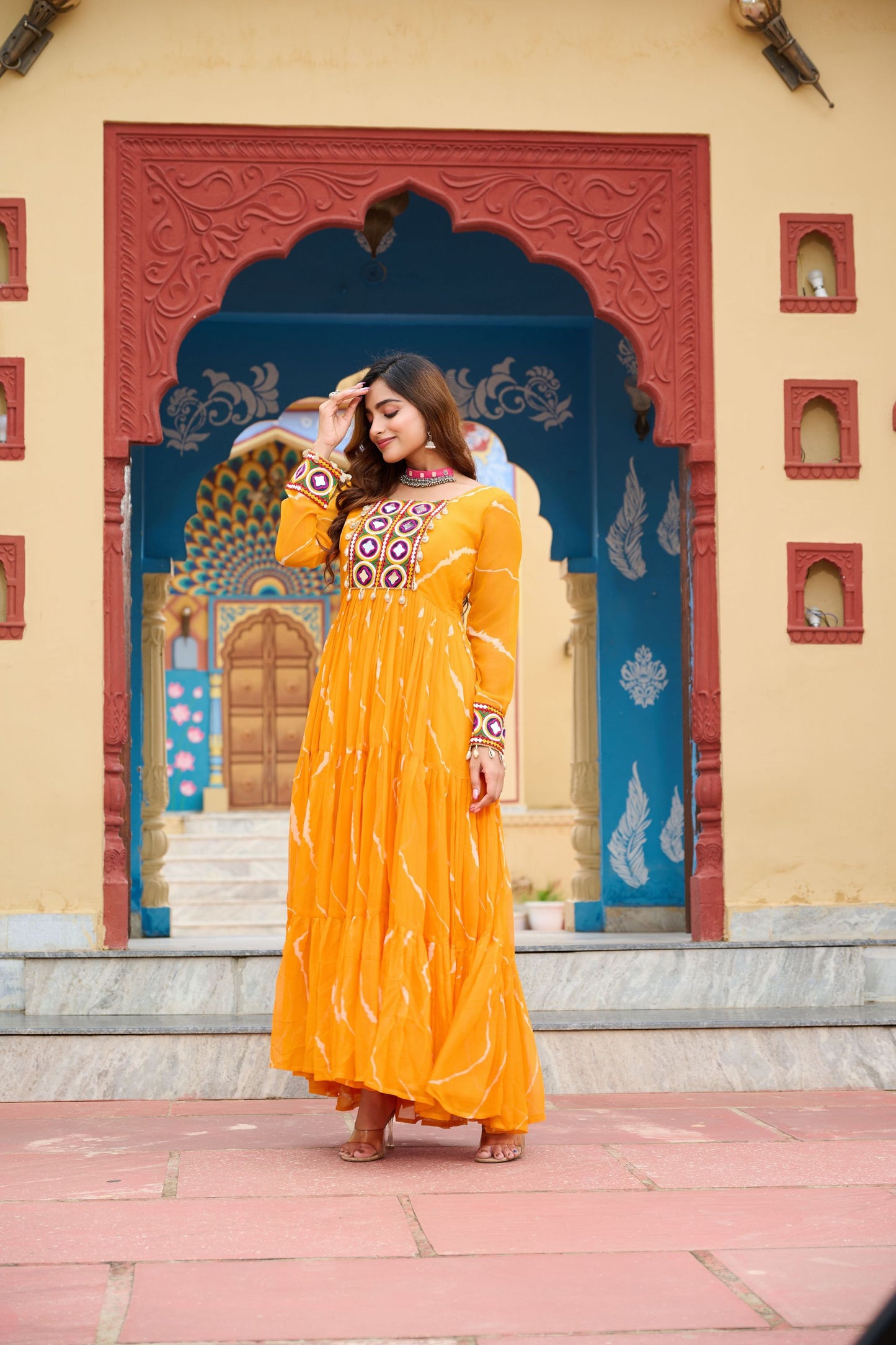 Mustard Yellow Bandhani Print Faux Georgette Gown with Mirror Work for Navratri