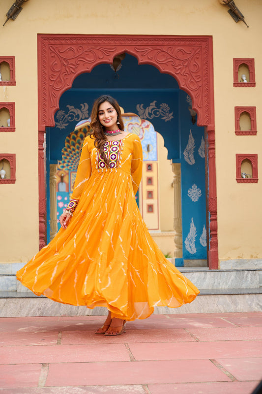 Mustard Yellow Bandhani Print Faux Georgette Gown with Mirror Work for Navratri