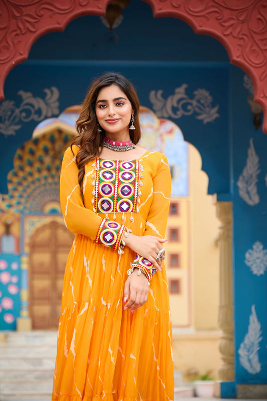 Mustard Yellow Bandhani Print Faux Georgette Gown with Mirror Work for Navratri