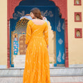 Mustard Yellow Bandhani Print Faux Georgette Gown with Mirror Work for Navratri