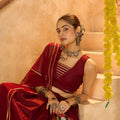 Maroon Silk Navratri Lehenga Choli with Gold Zari Border and Sleeveless Blouse