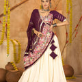 Cream Silk Navratri Lehenga Choli with Gold Zari Border and Purple Dupatta