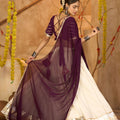 Cream Silk Navratri Lehenga Choli with Gold Zari Border and Purple Dupatta