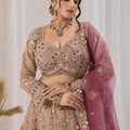 Opulent Mauve Net Designer Lehenga Choli with Heavy Embroidery Work and Dupatta