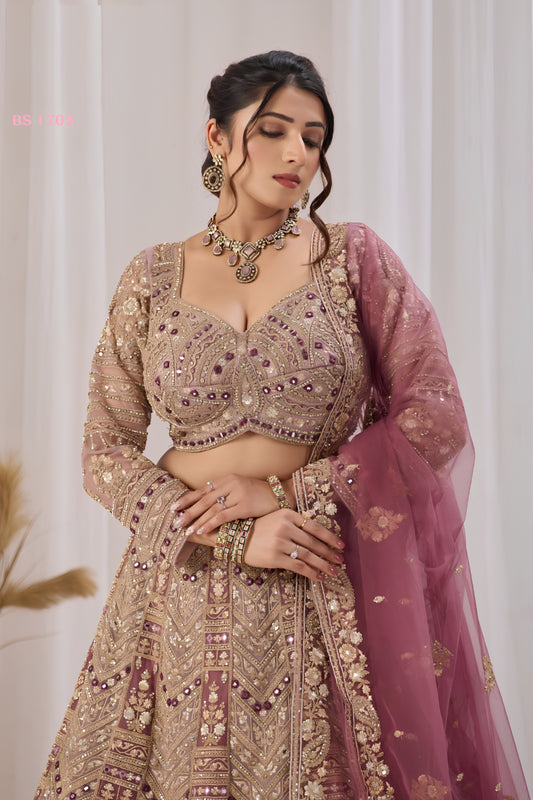 Opulent Mauve Net Designer Lehenga Choli with Heavy Embroidery Work and Dupatta