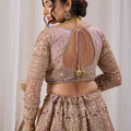 Opulent Mauve Net Designer Lehenga Choli with Heavy Embroidery Work and Dupatta
