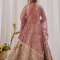 Opulent Mauve Net Designer Lehenga Choli with Heavy Embroidery Work and Dupatta
