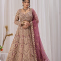 Opulent Mauve Net Designer Lehenga Choli with Heavy Embroidery Work and Dupatta