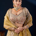 Radiant Beige Tissue Silk Designer Lehenga Choli with Heavy Embroidery Work and Mustard Yellow Dupatta