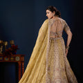 Radiant Beige Tissue Silk Designer Lehenga Choli with Heavy Embroidery Work and Mustard Yellow Dupatta
