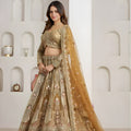 Royal Gold Designer Net Lehenga Choli with Embroidery Work and Matching Dupatta for Wedding