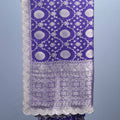 Purple Banarasi Silk Saree with Intricate Silver Motifs and Rich Border