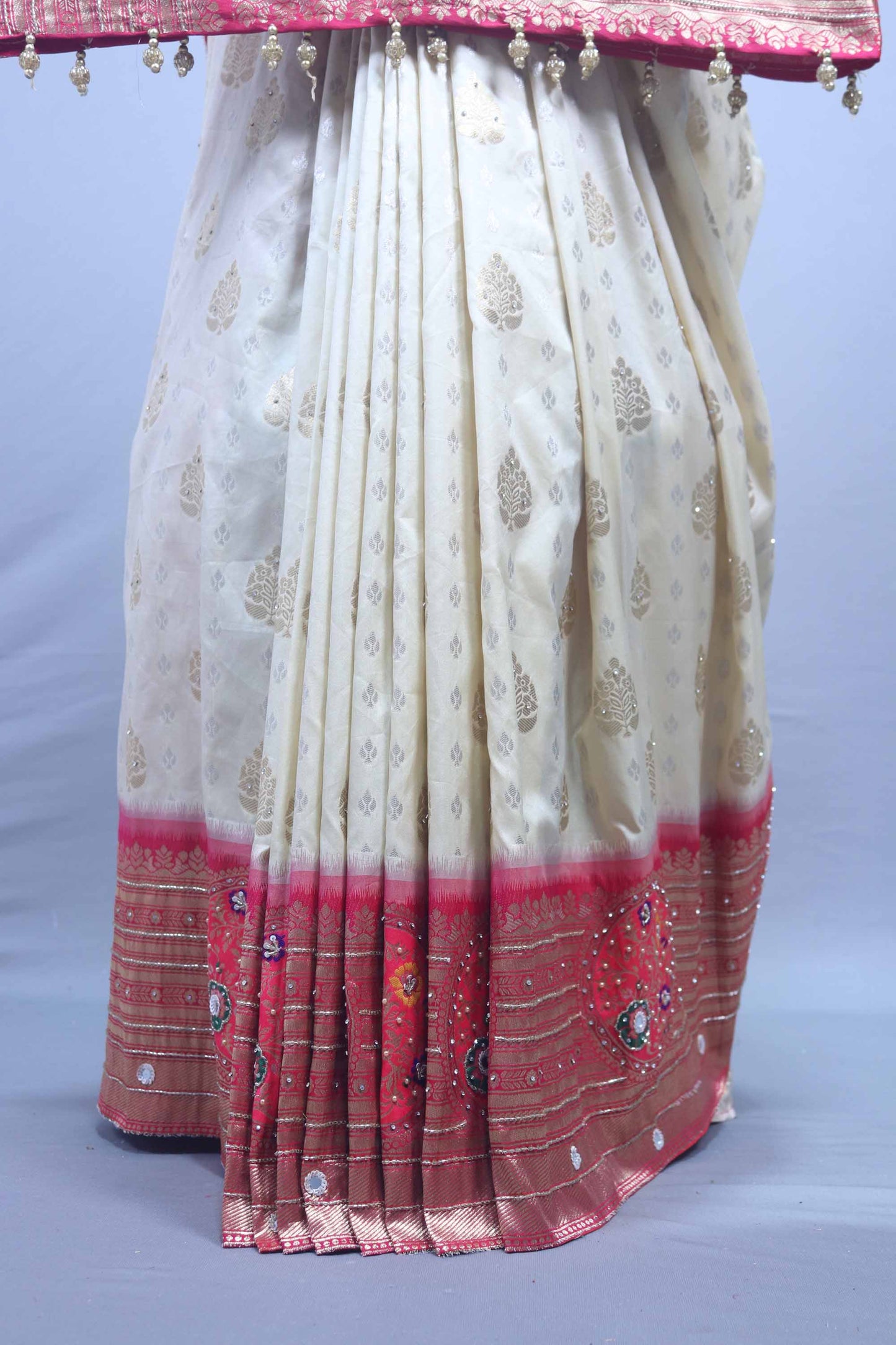 Off White Banarasi Silk Saree with Golden Motifs Pink Zari Border