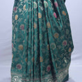 Green Embroidered Silk Saree with Floral Motifs Traditional Border
