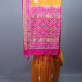 Mustard Yellow Silk Saree with Pink Woven Zari Border Tassels Pallu 