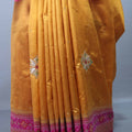 Mustard Yellow Silk Saree with Pink Woven Zari Border Tassels Pallu