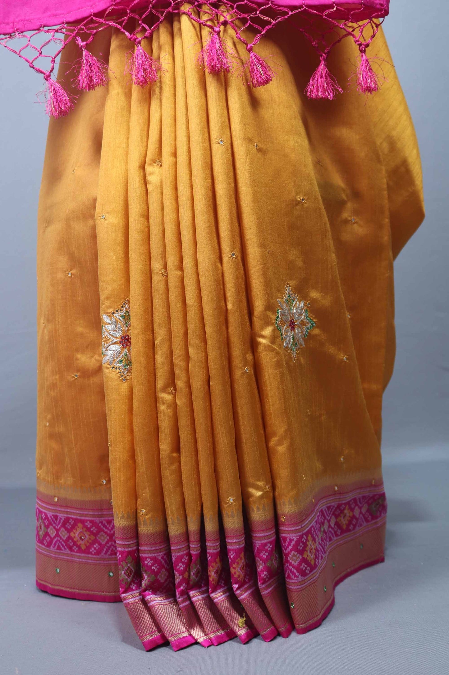 Mustard Yellow Silk Saree with Pink Woven Zari Border Tassels Pallu