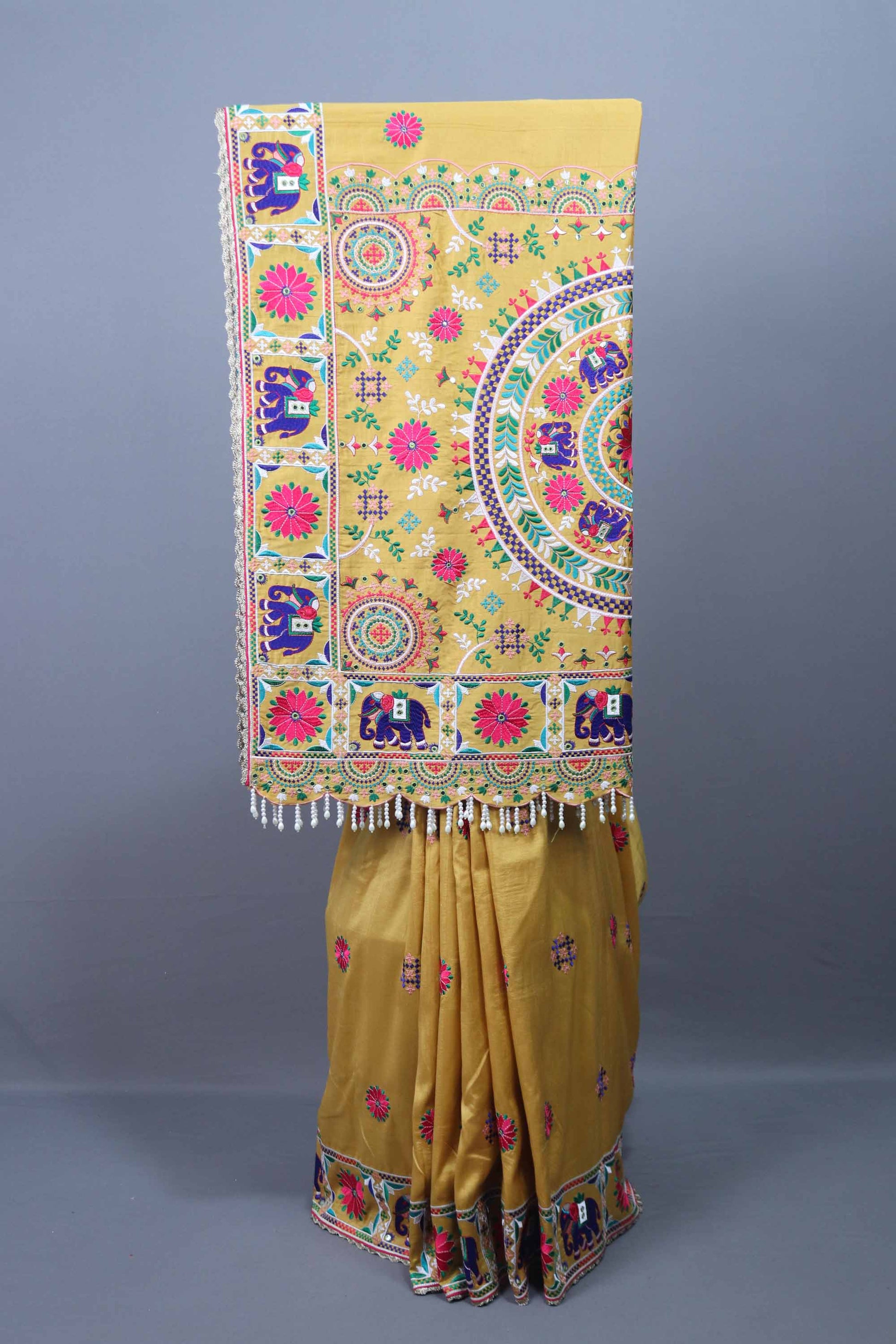 Mustard Yellow Silk Saree Multicolor Motif Embroidery Tasselled Pallu 