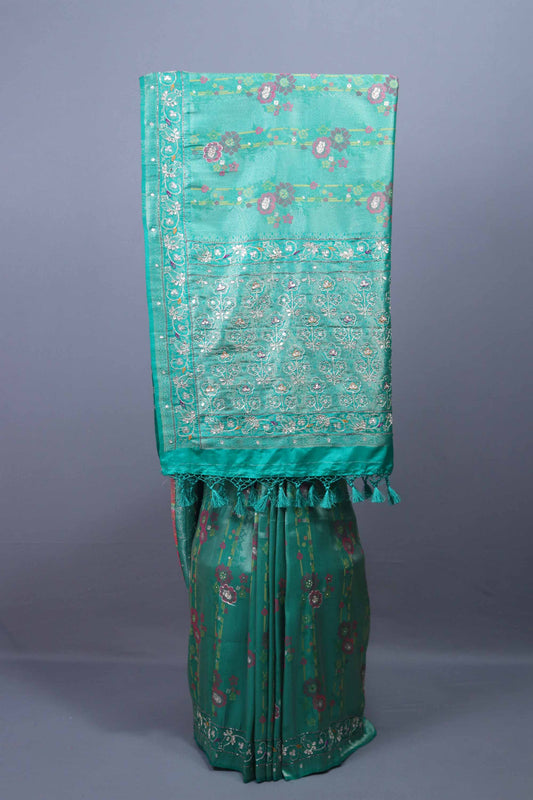 Teal Green Silk Saree Floral Embroidery Woven Border Tasselled Pallu 