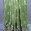 Pista Green Embroidered Silk Saree with Silver Zari Border