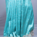 Turquoise Blue Silk Saree with Silver Zari Embroidered Lace Border