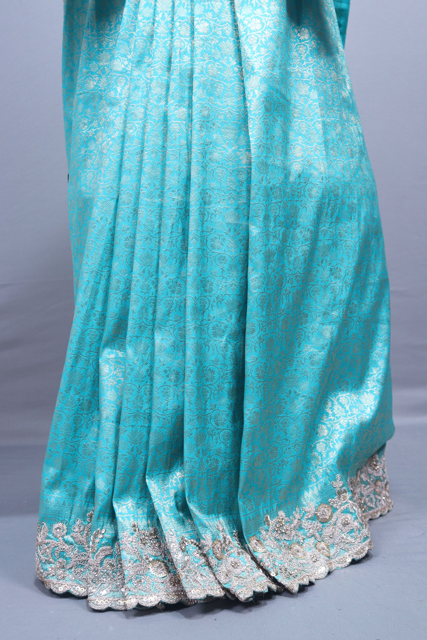 Turquoise Blue Silk Saree with Silver Zari Embroidered Lace Border