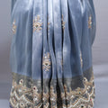 Dusty Blue Organza Silk Saree with Heavy Embroidered Border