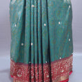 Green Red Banarasi Silk Saree with Intricate Zari Work and Tassel Pallu