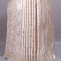 Off White Embroidered Silk Saree with Floral Pallu Tassel Border