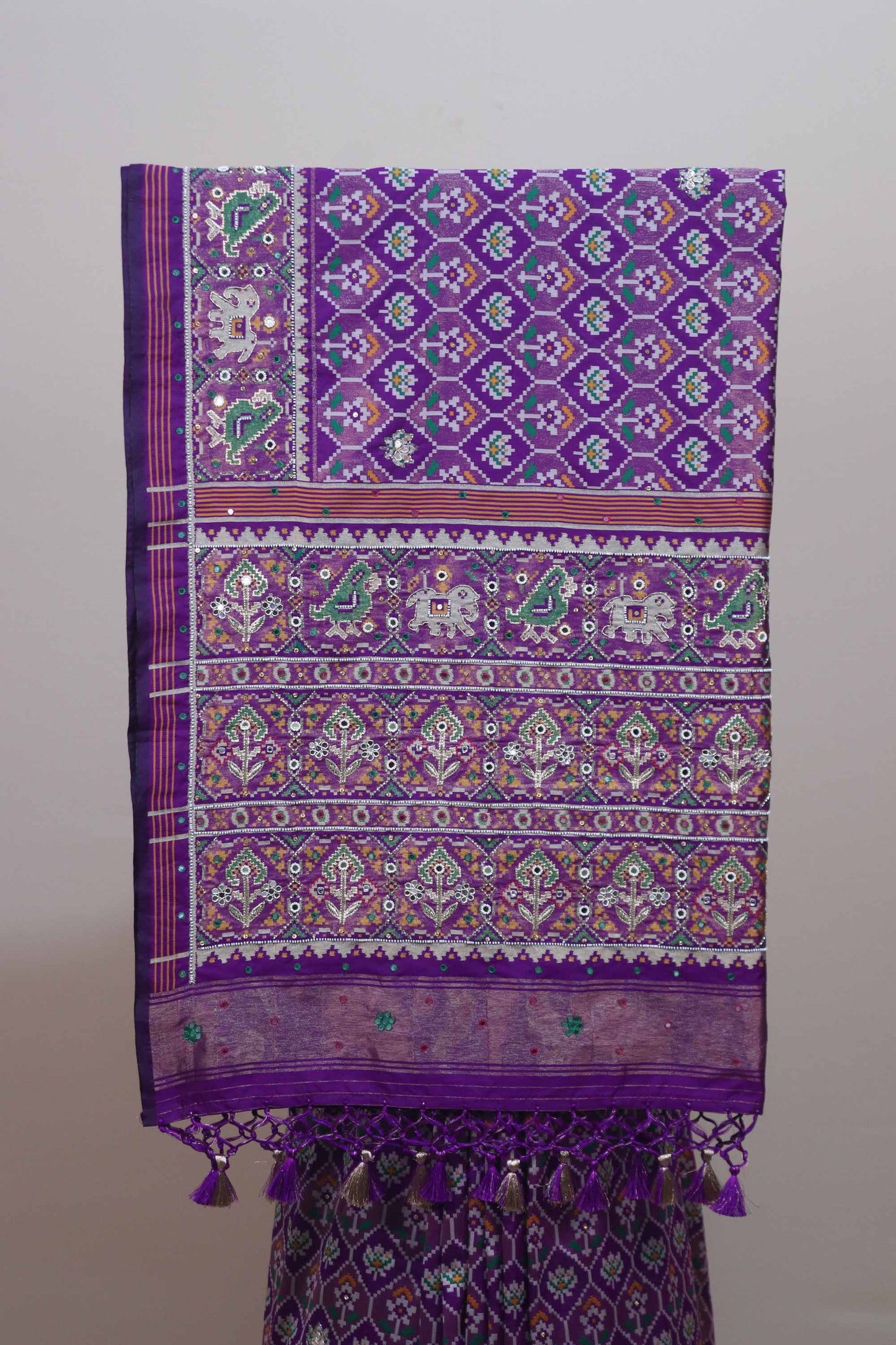 Purple Patola Print Saree with Traditional Border Tassel Pallu
