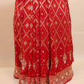 Red Bandhani Designer Saree with Zari Motifs Embroidered Border