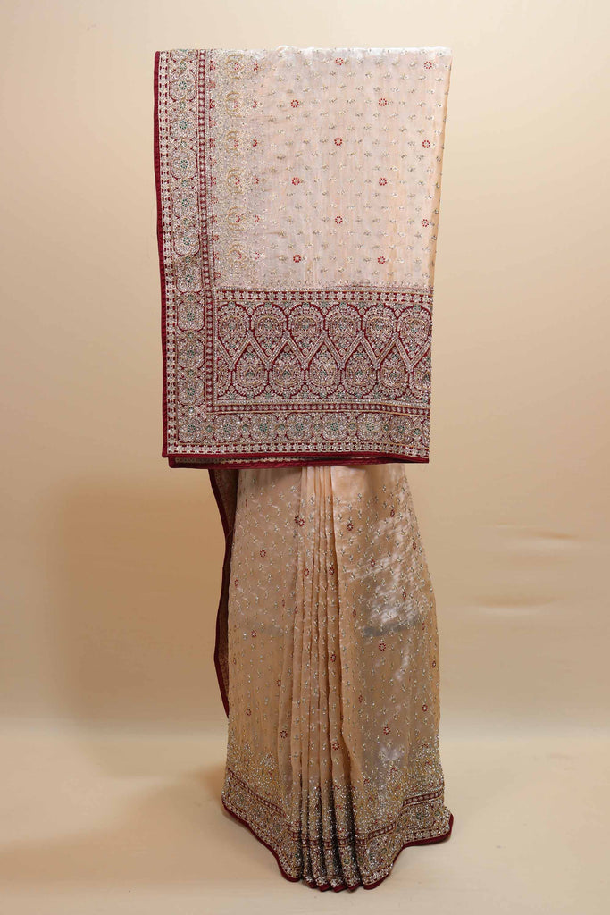 Cream Embroidered Saree with Heavy Zari Border Traditional Motifs Saree