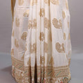 Off-White Silk Saree Gold Paisley Motifs Embroidered Border