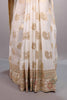 Off-White Silk Saree Gold Paisley Motifs Embroidered Border