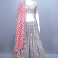 Elegant Grey Mirror Work Embroidered Lehenga Choli with Red Bandhani Dupatta