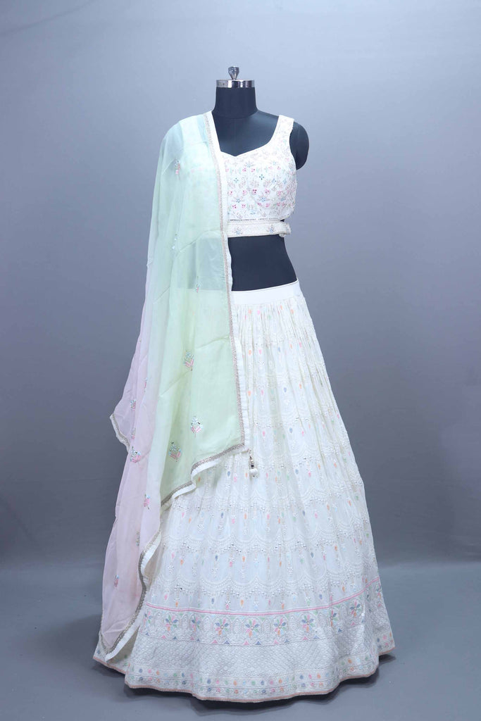 Elegant White Embroidered Lehenga Choli with Pastel Dupatta