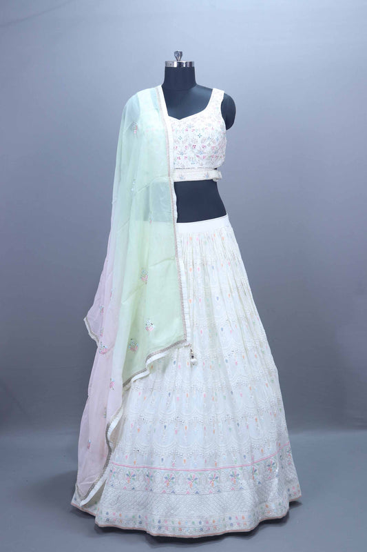 Elegant White Embroidered Lehenga Choli with Pastel Dupatta